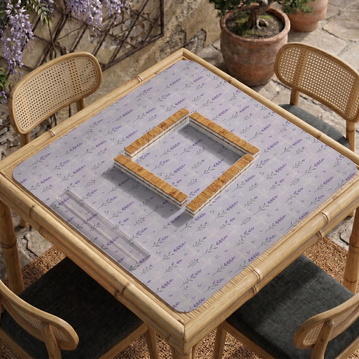 Lavender mahjong mat with a pale purple background, small botanical sprigs, and fine grid lines.