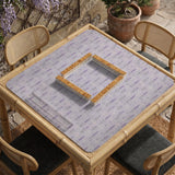 Lavender mahjong mat with a pale purple background, small botanical sprigs, and fine grid lines.
