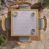 Lavender mahjong mat with a pale purple background, small botanical sprigs, and fine grid lines.