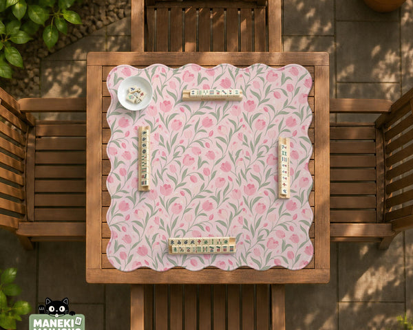 Pink mahjong mat with a botanical tulip floral pattern in blush tones, shown in a tablecloth-style square layout.
