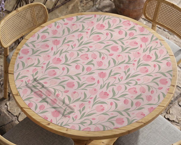 Pink mahjong mat with a tulip floral pattern in blush and sage tones and a scalloped edge.