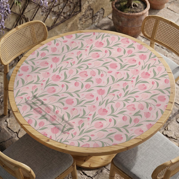 Pink mahjong mat with a tulip floral pattern in blush and sage tones and a scalloped edge.