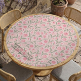 Pink mahjong mat with a tulip floral pattern in blush and sage tones and a scalloped edge.