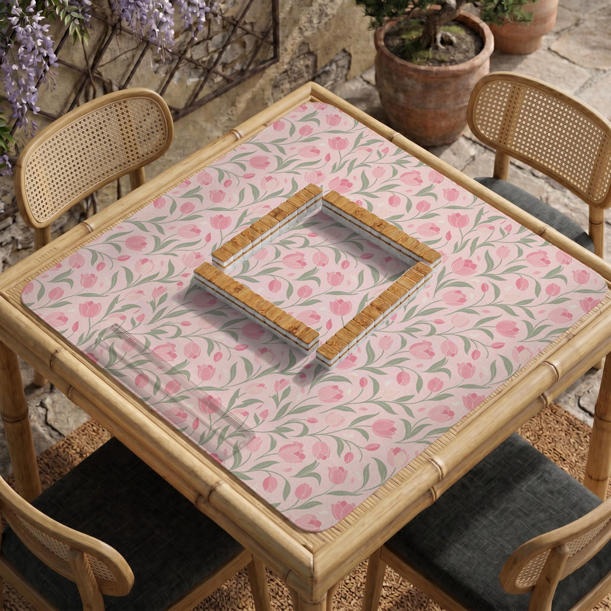 Pink mahjong mat with a botanical tulip floral pattern in blush tones, shown in a tablecloth-style square layout.