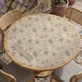 Neutral floral mahjong mat with delicate botanical line art and a scalloped edge on a cream background.