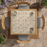 Neutral floral mahjong mat with delicate botanical line art and a scalloped edge on a cream background.