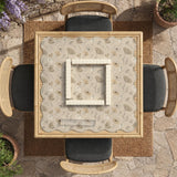 Neutral floral mahjong mat with delicate botanical line art and a scalloped edge on a cream background.