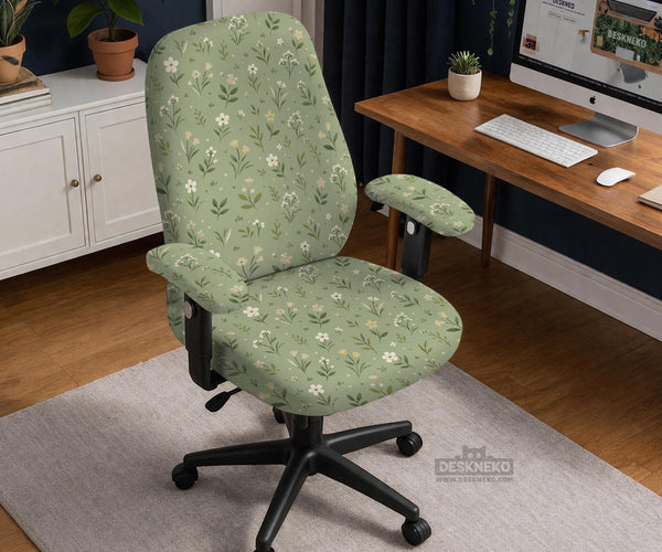 Sage green chair cover with a small floral print shown on a desk chair with a high back.
