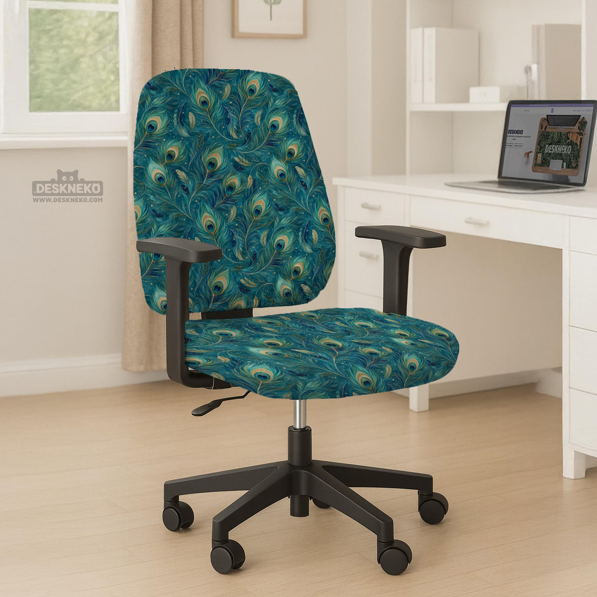A blue green chair cover with a peacock feather design shown on an office chair with armrests.