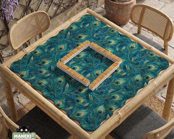 Teal mahjong mat with a peacock feather pattern in blue green tones.