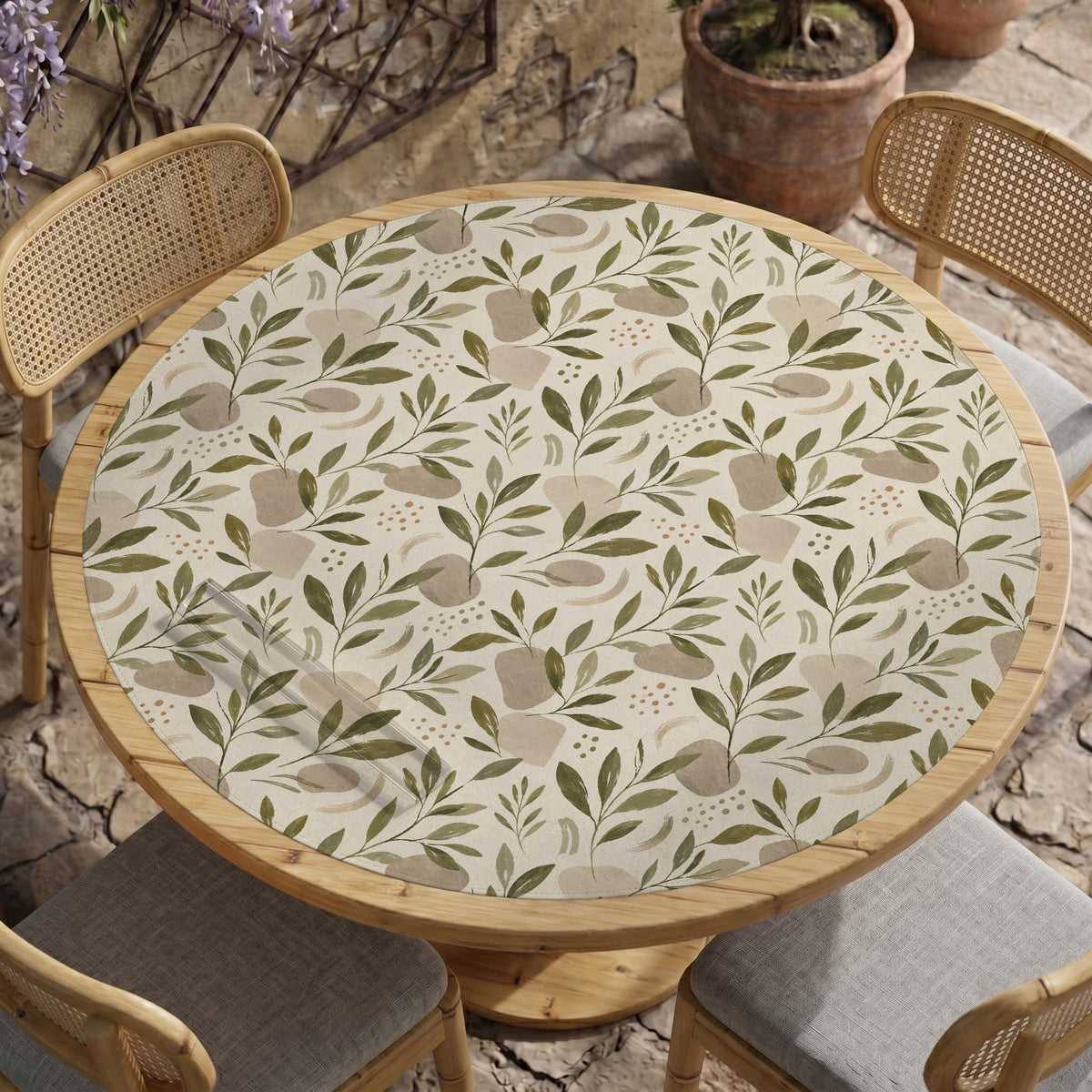 Green botanical mahjong mat with sage leaf and floral design and a scalloped edge.