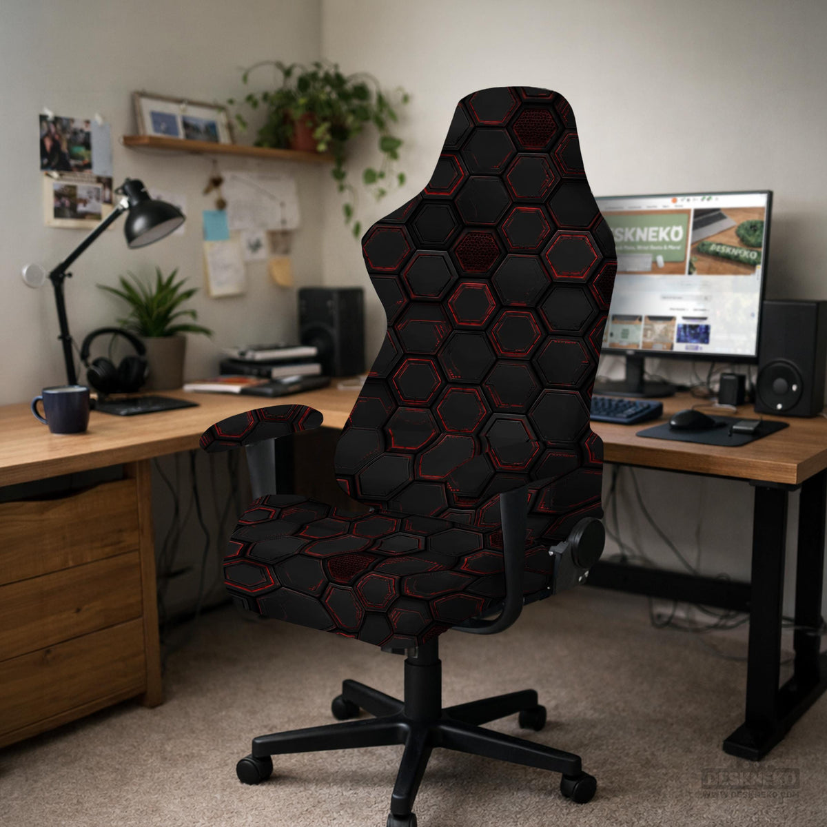 Black chair cover with a dark red geometric pattern shown on an office chair, with a fitted stretch look.