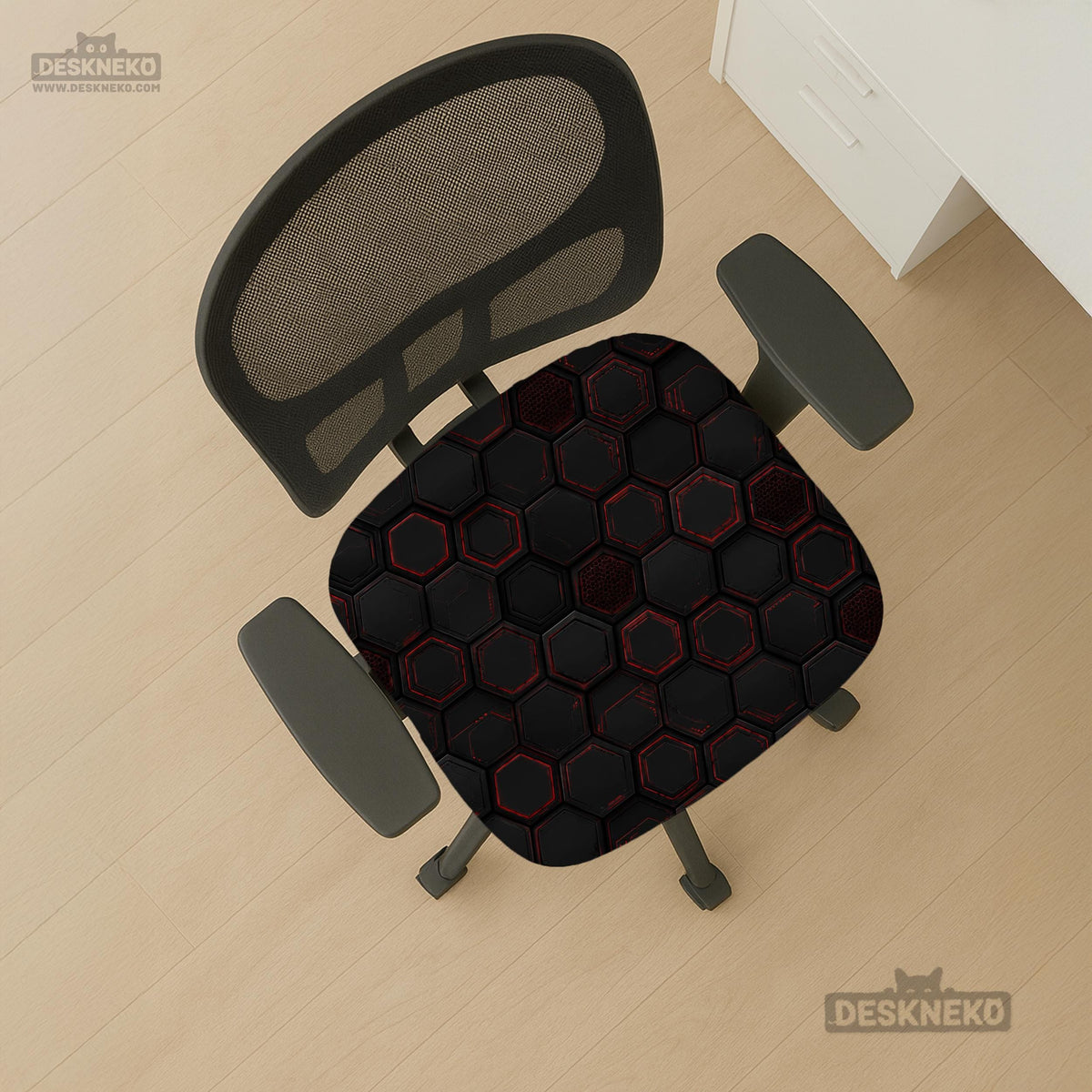 Black chair cover with a dark red geometric pattern shown on an office chair, with a fitted stretch look.