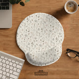 Ivory mouse pad and keyboard wrist rest with delicate wildflower line art in sage, taupe, and cream tones.