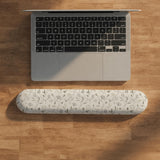 Ivory mouse pad and keyboard wrist rest with delicate wildflower line art in sage, taupe, and cream tones.