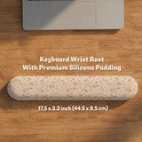 Blush pink floral mouse pad with wrist rest options, shown with peach blossoms, muted leaves, and a warm cream background.