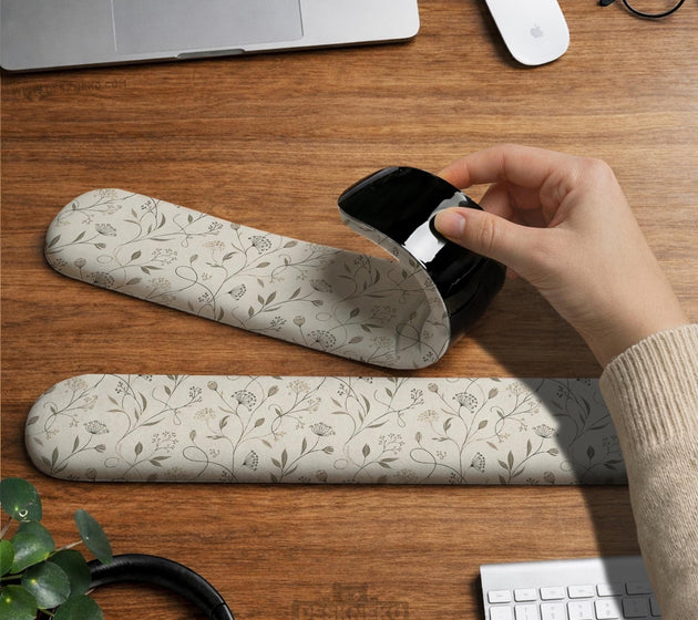 Ivory mouse pad and keyboard wrist rest with delicate wildflower line art in sage, taupe, and cream tones.