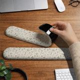 Ivory mouse pad and keyboard wrist rest with delicate wildflower line art in sage, taupe, and cream tones.