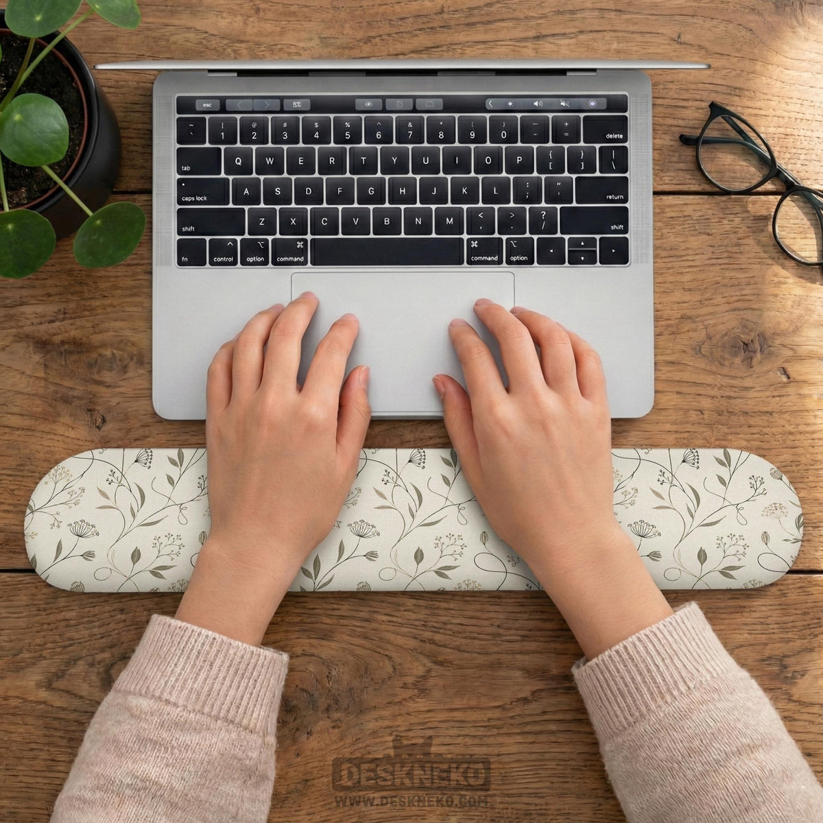 Ivory mouse pad and keyboard wrist rest with delicate wildflower line art in sage, taupe, and cream tones.