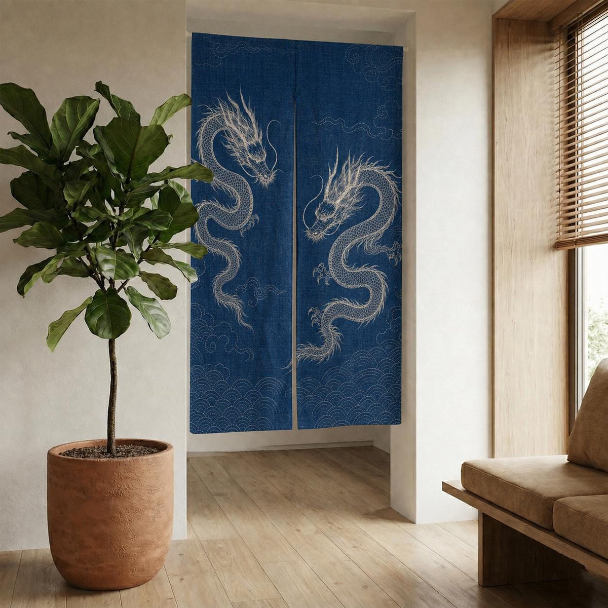 Indigo white dragon noren hung in a bright room doorway beside a potted plant and wooden bench.