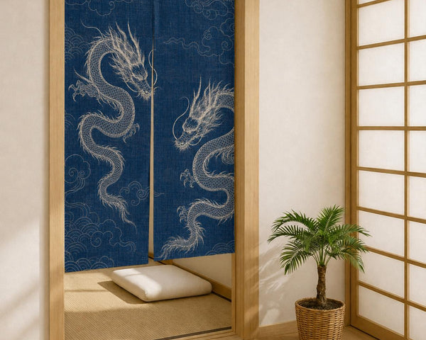 Angled view of the indigo white dragon noren beside a shoji screen, showing natural panel drape.