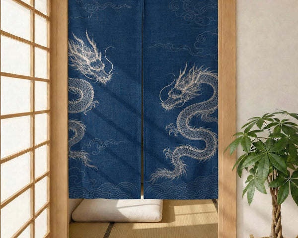 Indigo noren curtain with two white dragons in a wooden doorway, split panels hanging over a tatami room.