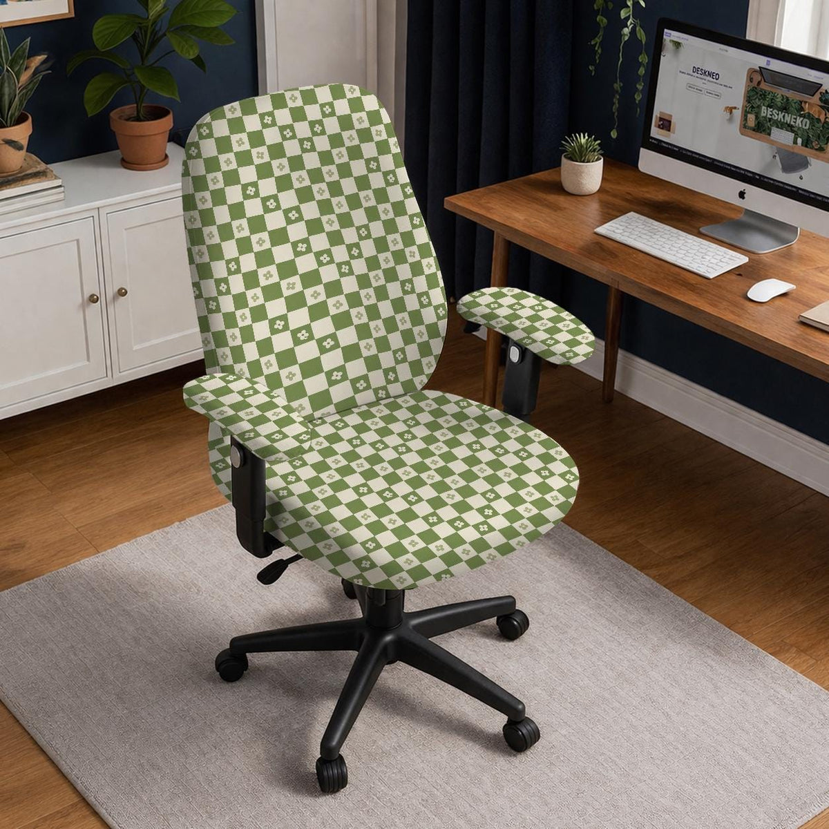 Gaming chair cover with a green and ivory checker pattern and small four-petal flowers.