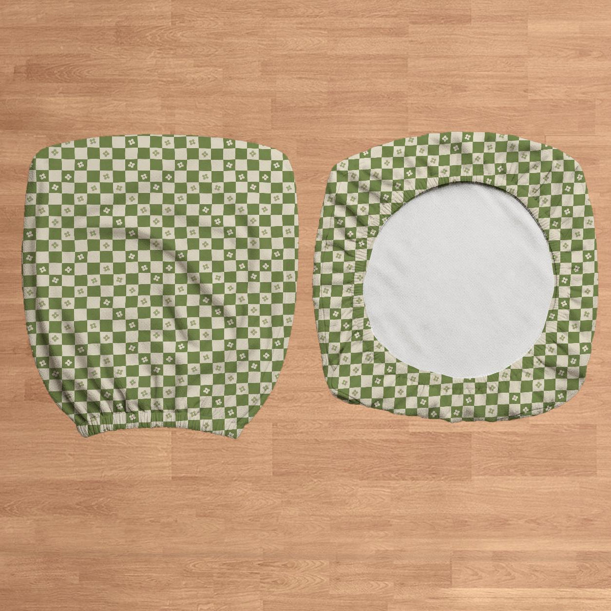 Gaming chair cover with a green and ivory checker pattern and small four-petal flowers.