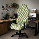 An office chair cover with a matcha green and ivory checker pattern and small four-petal flowers.
