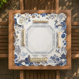 Square ivory mahjong mat with blue cranes, pagodas, flowers, and a blue border around the playing area.