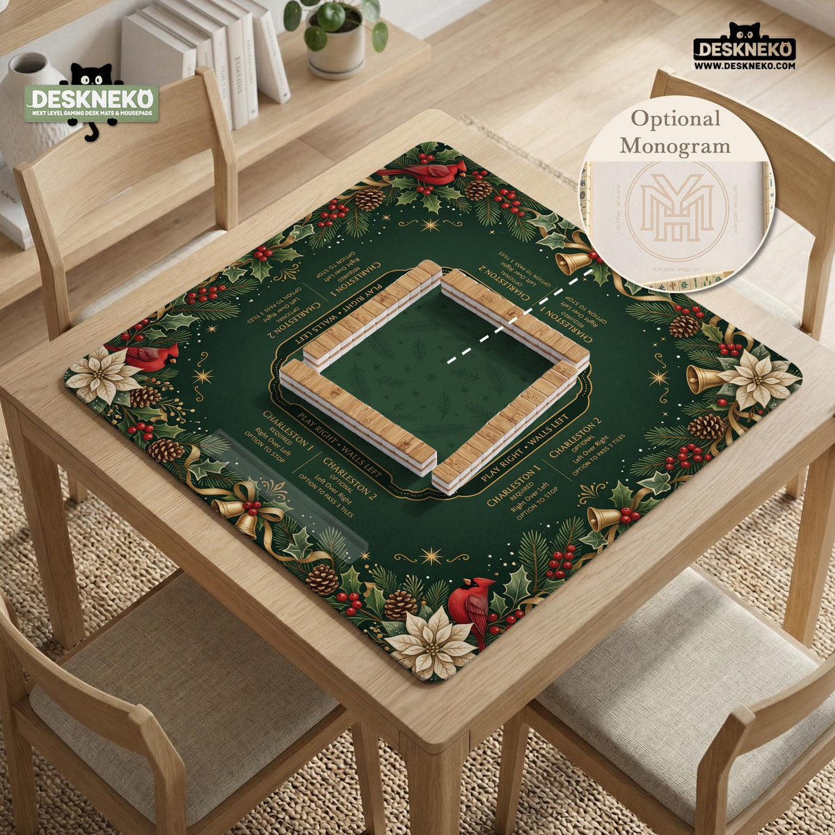 Green mahjong mat with red cardinals, holly berries, cream poinsettias, and gold seasonal details around a printed Charleston guide.