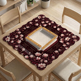 Cream American mahjong mat with a burgundy border of pale pink magnolia blossoms and printed play-direction and passing reminders.