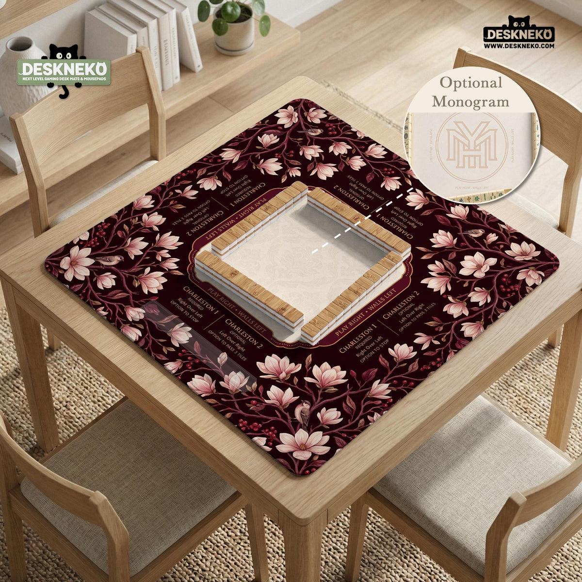 Cream American mahjong mat with a burgundy border of pale pink magnolia blossoms and printed play-direction and passing reminders.