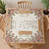American mahjong mat with an ivory center, printed play-direction reminders, and a border of dusty-pink roses, ribbon bows, and green leaves.
