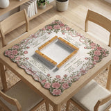 American mahjong mat with an ivory center, printed play-direction reminders, and a border of dusty-pink roses, ribbon bows, and green leaves.