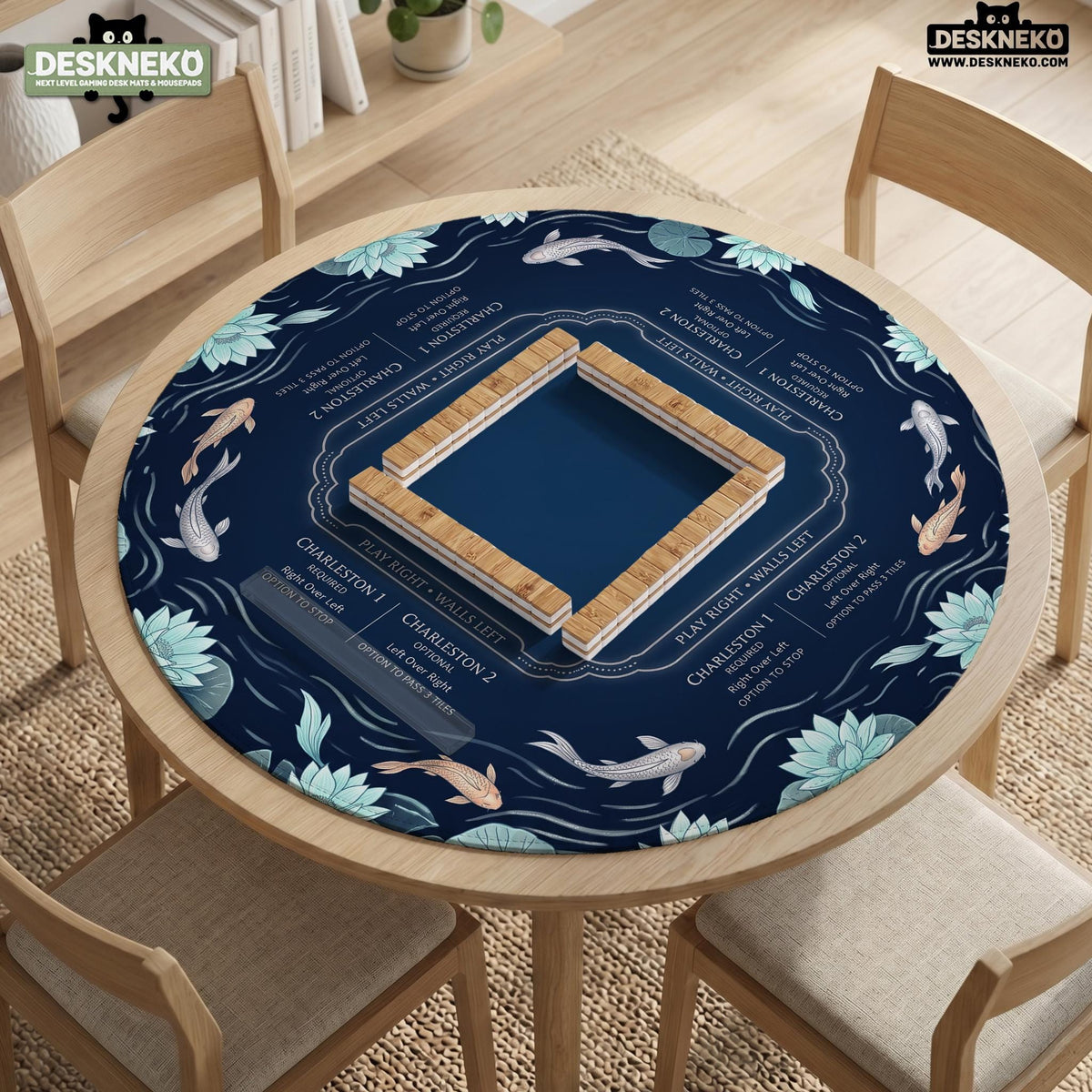 American mahjong mat with a navy-blue pond design, pale aqua lotus flowers, flowing water lines, koi fish, and printed play-direction and Charleston passing reminders.