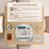 American mahjong mat with a cream center and a coastal border showing oyster shells, scallop shells, starfish, pearl strands, and pale blue sea plants.