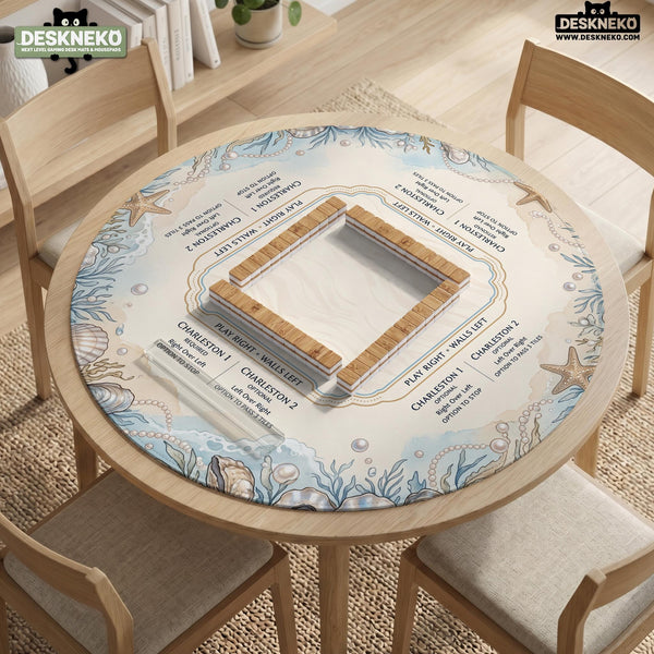 American mahjong mat with a cream center and a coastal border showing oyster shells, scallop shells, starfish, pearl strands, and pale blue sea plants.