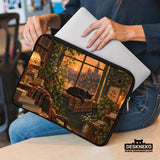 Illustration of a black cat beside stacked books and leafy plants in forest green, brown, and amber tones on a laptop sleeve and shoulder bag design.
