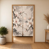 Ivory floral curtain with magnolia blossoms and fine ink branches in charcoal, taupe, and pale blush on a light background.