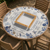 Square ivory mahjong mat with blue cranes, pagodas, flowers, and a blue border around the playing area.