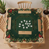 Green mahjong mat with red cardinals, holly berries, cream poinsettias, and gold seasonal details around a printed Charleston guide.