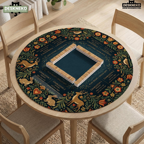 Square mahjong mat with a dark teal center, illustrated woodland animals, red and ochre flowers, green foliage border, and a printed Charleston guide around the playing area.