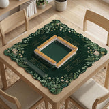 Square mahjong mat with a forest green botanical design, fern leaves, small cream flowers, and a printed Charleston guide around the center area.