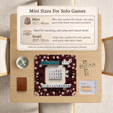 Cream American mahjong mat with a burgundy border of pale pink magnolia blossoms and printed play-direction and passing reminders.