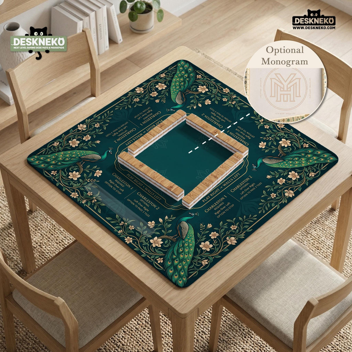 American mahjong mat with a deep teal-green background, peacocks, small cream flowers, leafy branches, and printed play-direction and Charleston reminders.