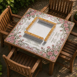 American mahjong mat with an ivory center, printed play-direction reminders, and a border of dusty-pink roses, ribbon bows, and green leaves.