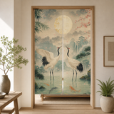 Jade green crane Japanese noren curtain hanging in a bright minimalist doorway.