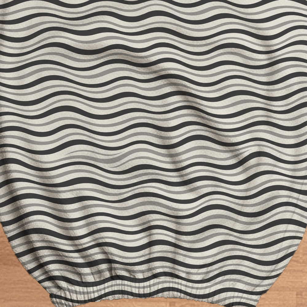 Monochrome Ripple fabric and elastic detail; selected cover option only, chair not included.
