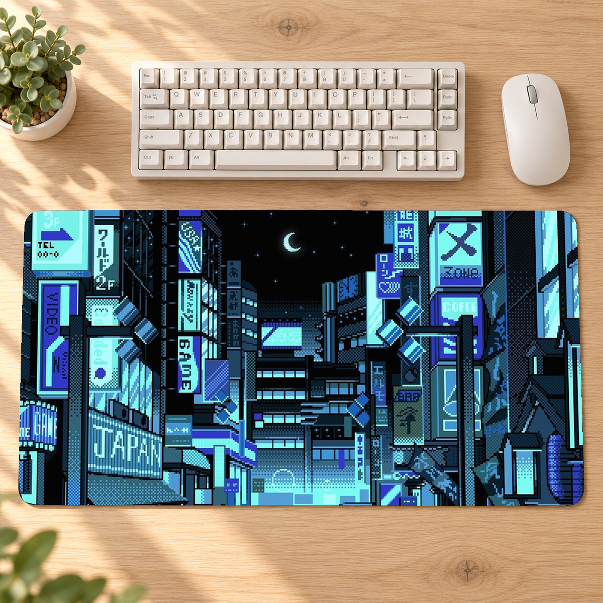 Cyan light blue Tokyo pixel-art desk mat on an oak workspace